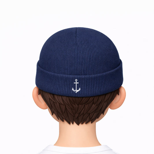 Navy blue beanie with an anchor emblem worn by a cartoon character on a white background