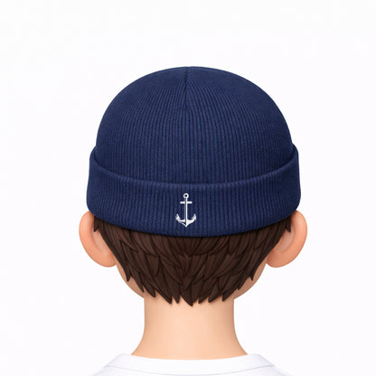 Navy blue beanie with an anchor emblem worn by a cartoon character on a white background